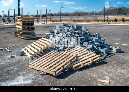 Horizontal shot of a pile of broken cinder blocks near a construction site. Stock Photo