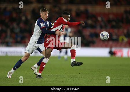 MIDDLESBROUGH, UK. FEB 22ND Middlesbrough's Isaiah Jones battles with West Bromwich Albion's Conor Townsend during the Sky Bet Championship match between Middlesbrough and West Bromwich Albion at the Riverside Stadium, Middlesbrough on Tuesday 22nd February 2022. (Credit: Mark Fletcher | MI News) Credit: MI News & Sport /Alamy Live News Stock Photo