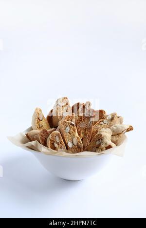 Cantucci, traditional Italian almond cookies from Tuscany on white background. Stock Photo
