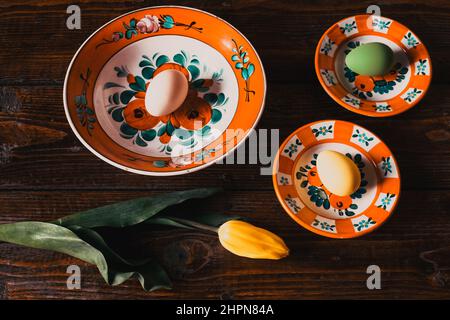 easter eggs on beautiful Hungarian traditional plates with floral ornaments Stock Photo