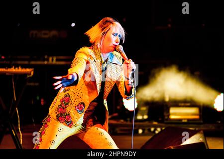 Karen O, lead singer of the group The Yeah, Yeah, Yeah's performs at the Coachella Valley Music and Arts Festival. Stock Photo