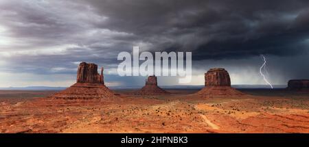 Monument Valley, Arizona lightning storm over the Mittens Stock Photo
