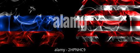 Donetsk People's Republic vs Indonesia, Indonesian, Naval Jack flag. Smoke flags placed side by side isolated on black background. Stock Photo