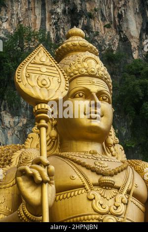 Close up of the face of the Murugan Statue (Tugu Dewa Murugga) in Batu Caves, Selangor, Kuala Lumpur. Tallest statue of a Hindu deity in Malaysia Stock Photo