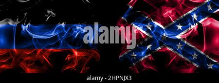Donetsk People's Republic vs United States of America, America, US, USA, American, Confederate Navy Jack flag. Smoke flags placed side by side isolate Stock Photo
