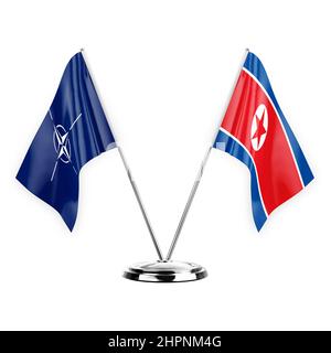 Two table flags isolated on white background 3d illustration, nato and north korea Stock Photo