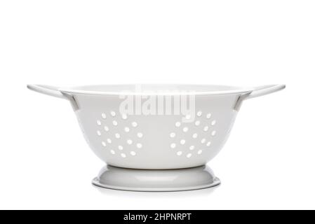 Side view of a white Metal Colander isolated on white. Stock Photo