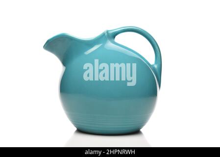 Green pitcher isolated on white. Stock Photo