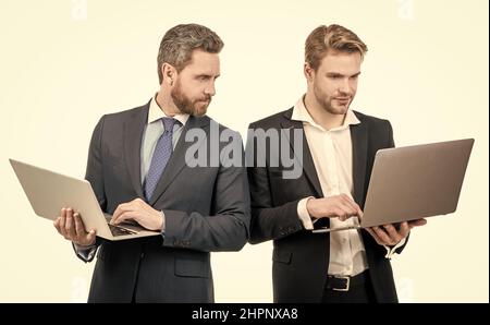 Doing business online. Digital professionals. Businessmen work on computers. E-commerce business Stock Photo