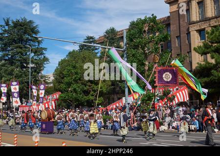 Nagoya, Japan - October 20, 2019: The participants in the historical costumes with the coat of army of Oda Nobunaga at the procession of Three Feudal Stock Photo