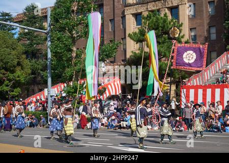 Nagoya, Japan - October 20, 2019: The participants in the historical costumes with the coat of army of Oda Nobunaga at the procession of Three Feudal Stock Photo