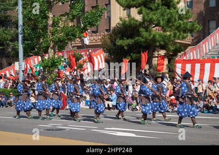 Nagoya, Japan - October 20, 2019: Participants of autumn Nagoya festival wearing the historical costumes of warriors (Ashigaru) of feudal lord army of Stock Photo