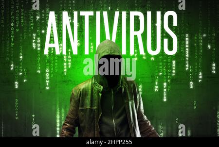 Faceless hacker with inscription Stock Photo