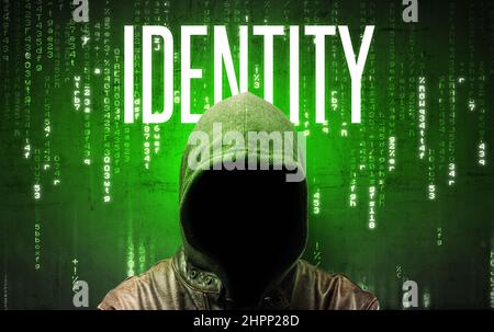 Faceless hacker with inscription Stock Photo