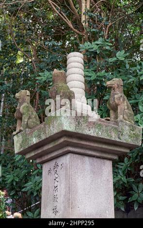 Nagoya, Japan - October 20, 2019: An altar with the statues of dogs and cat at the area which is dedicated to the dead pets near the pet cementery at Stock Photo