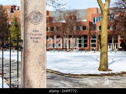 Cambridge, Massachusetts, USA - February 16, 2022: Close-up of  stone pillar of the John F. Kennedy Memorial Park's entrance gate. Stock Photo