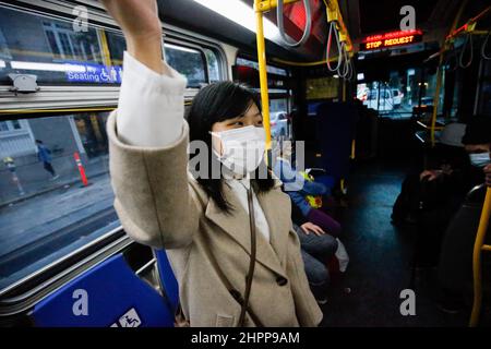 San Francisco, United States. 21st Feb, 2022. Yanni Ho seen in a bus in San Francisco. Yanni Ho, a 18 year old girl who comes from Hong Kong was a suspect of Hong Kong Police force since the national security law. Ho had been arrested twice by national security department of Hong Kong Police in 2020, she decided to leave Hong Kong in 2021 and moved to the United States to ensure her safety. (Photo by Michael Ho Wai Lee/SOPA Images/Sipa USA) Credit: Sipa USA/Alamy Live News Stock Photo