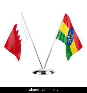 Two table flags isolated on white background 3d illustration, bahrain and ethiopia Stock Photo