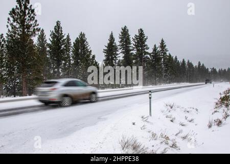 Reno, United States. 22nd Feb, 2022. Cars drive up a mountain road. Winter road conditions worsen as snow falls in the mountains. Chains where required on all vehicles except 4-Wheel drive with snow tires. Credit: SOPA Images Limited/Alamy Live News Stock Photo