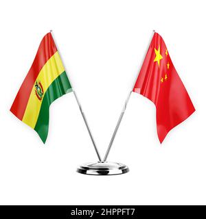 Two table flags isolated on white background 3d illustration, bolivia and china Stock Photo