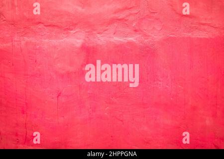 Pink colored grunge cement wall texture background. Stock Photo