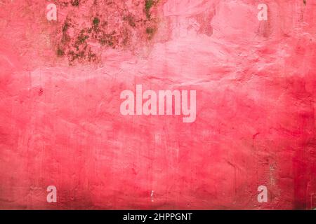 Pink colored grunge cement wall texture background. Stock Photo