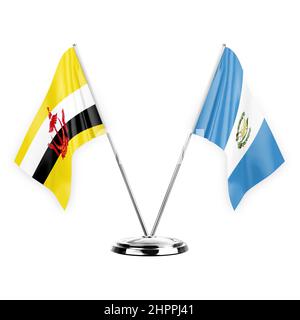 Two table flags isolated on white background 3d illustration, brunei and guatemala Stock Photo