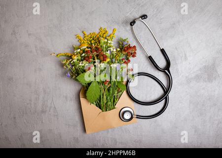 Herbs on gray background top view frame copy space. Stock Photo