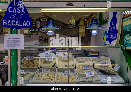 Pamplona, Spain - June 24, 2021: Dried pieces of salted cod or bacalao, traditional Spanish delicacy for sale at a market in the old town, Casco Viejo Stock Photo