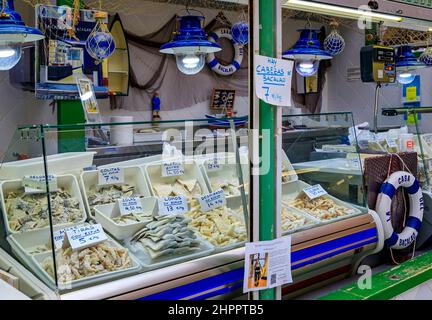 Pamplona, Spain - June 24, 2021: Dried pieces of salted cod or bacalao, traditional Spanish delicacy for sale at a market in the old town, Casco Viejo Stock Photo
