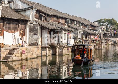 Old traditional wooden houses along the main canal in Wenzhou Water Village, China Stock Photo