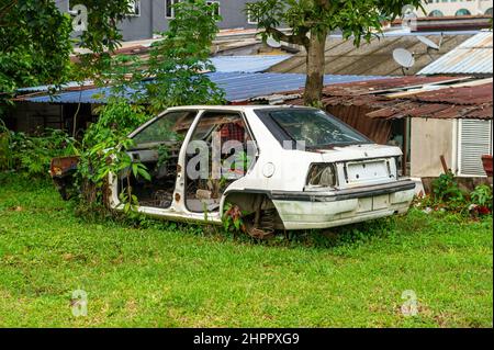 Abandoned Proton Car at Kampung Baru, Kuala Lumpur Stock Photo