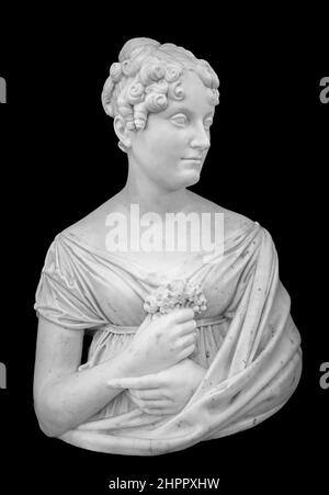 Gypsum copy of ancient statue of thinking young lady isolated on black background. Side view of plaster sculpture woman face Stock Photo