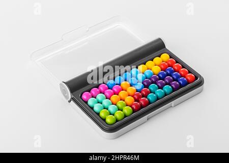 Iq puzzle colorful balls. Puzzler board game with pieces Stock Photo