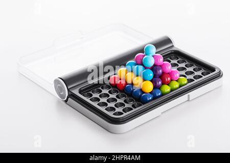 Iq puzzle colorful balls. Puzzler board game with pieces Stock Photo