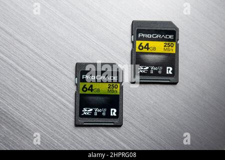 Two ProGrade SD cards on a silver background Stock Photo