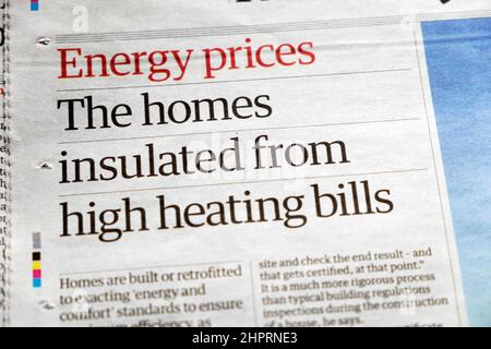 Guardian newspaper headline article clipping 'Energy prices The homes insulated from high heating bills' February 2022 London England UK Stock Photo