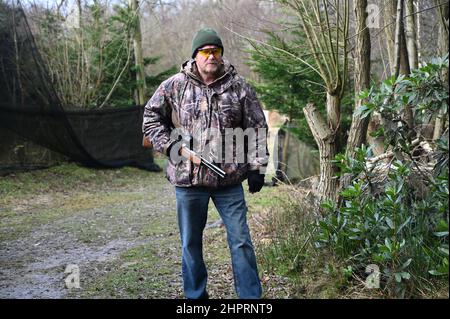 A hunter with a hunting rifle in the UK. Stock Photo