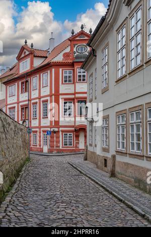 Old narrow street with stone road and lanterns in Visby, Sweden Stock Photo