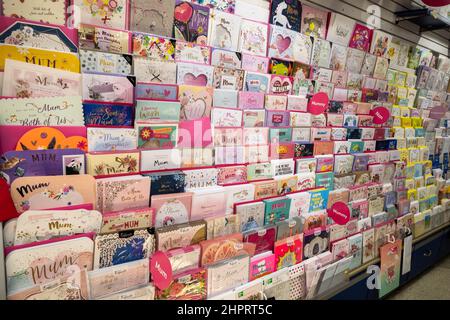 Assorted shelf of colourful birthday cards in a Store in Norwich Stock Photo