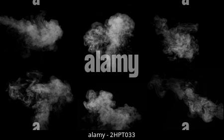 White horizontal steam, smoke isolated on black background. a