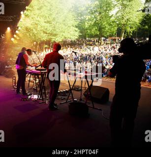 Ready to rock. Cropped shot of a musicians feet on stage at an outdoor music festival. Stock Photo