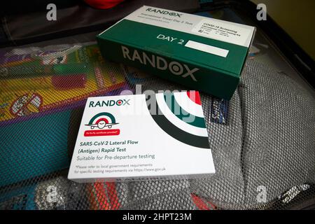 pre-departure lateral flow rapid antigen test and day 2 pcr Covid-19 test kits for travel for unvaccinated people returning to the uk Stock Photo