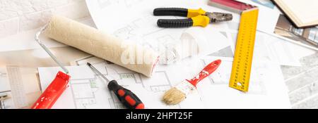 Construction blueprints with tools and tablet, top view Stock Photo
