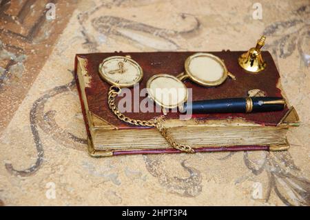 Old vintage diary book on marble table. Stock Photo