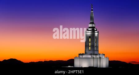 Pocatello Idaho LDS Mormon Latter-day Saint Temple with lights at sunset Angel Moroni Stock Photo