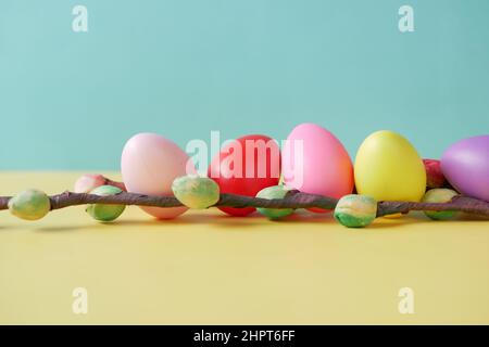 easter concept with multi color egg on color background. Stock Photo