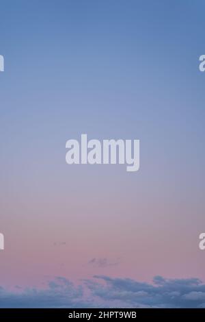 Dramatic Evening Pastel colored sky with clouds and copyspace Stock Photo