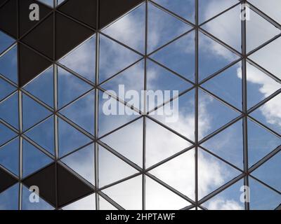 Glass roof, transparent with blue sky. Stock Photo