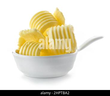 bowl of butter curls isolated on white background Stock Photo